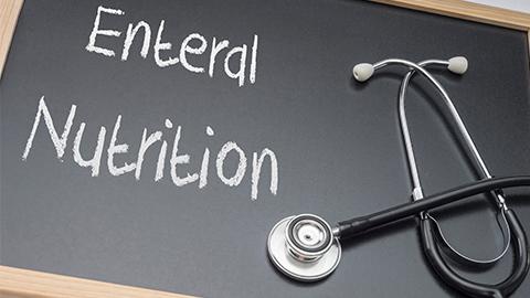 Tableau noir avec écrit : Enteral Nutrition